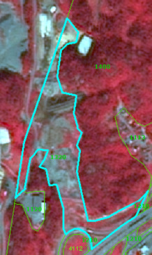 This image displays false-colour satellite imagery of land cover near Porsgun, Norway, captured on 2010-08-11 by the SPOT-5 sensor at 2.5 m resolution, using a 1/2/3 Band Combination. The source is CNES 2011©, distributed by Airbus DS/Spot Image. Dense vegetation, likely forests, appears in shades of dark red. Lighter areas indicate bare land, low-density vegetation, or urban structures. Roads are visible as dark linear features. Overlaid cyan and green polygons define specific land cover classes. A large cyan-outlined area is labelled `1320`, representing 'Land without current use' (likely corresponding to CORINE Land Cover class 132 'Dump sites' or similar degraded land). Several green-outlined areas are labelled `1400` (in a forested area), `1120` (Discontinuous urban fabric), `4112` (in two separate locations near roads), `1230` (near a road), `4113`, and `411` (smaller polygons on the right edge). The image serves as an example for detailed land cover classification in the context of the Copernicus Land Monitoring Service (CLMS) Nomenclature Guideline.