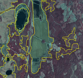 This map displays an aerial or satellite image of an exploited peat bog in Sweden, with yellow polygons delineating specific land cover areas. The background imagery is sourced from SPOT-5 data, credited to ESA, and shows a false-colour or infrared composite. Densely vegetated areas, likely forests, appear in shades of reddish-maroon, while open land and the exploited peat bog areas are greenish-grey. Water bodies, such as lakes and ponds, are dark blue or black. The yellow polygons represent the delineation of exploited peat bog areas as defined by CORINE Land Cover (CLC), which the accompanying text notes corresponds fairly to MAES delineation. These exploited peat bogs are visually characterized by distinct linear trench and parcel structures within the greenish-grey areas, consistent with peat extraction activities.